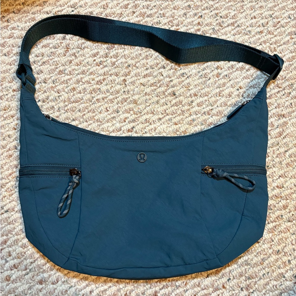 Lululemon Athletica Warp Teal Slouchy Sling Bag